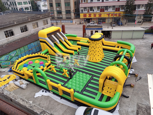 Reuzen buiten water droog opblaasbaar pretpark Nationaal Indoor Big Bounce House met Wipe Out Game Slide Klimmuur
