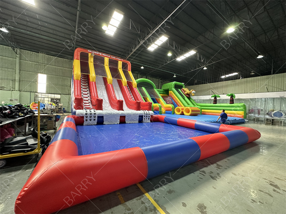 Buitengrote springhuis volwassenen kinderen pvc glijbaan met zwembad opblaasbaar waterpark voor plezier pretpark